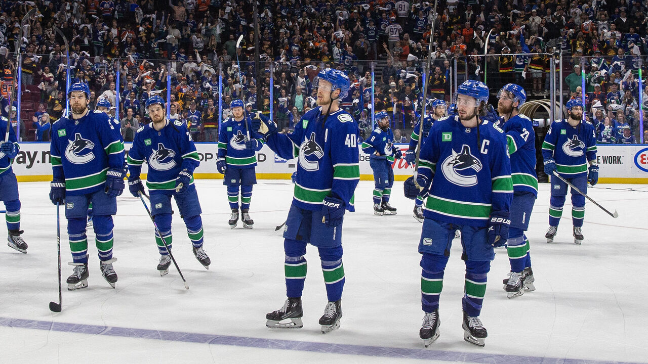 VANCOUVER, CANADA - MAY 20: The Vancouver Canucks wave in appreciation to fans after Game Seven of the Second Round of the 2024 Stanley Cup Playoffs loss against the Edmonton Oilers at Rogers Arena on May 20, 2024 in Vancouver, British Columbia, Canada. Edmonton won 3-2
