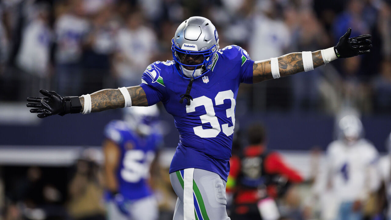 ARLINGTON, TEXAS - NOVEMBER 30: Jamal Adams #33 of the Seattle Seahawks celebrates after a play during an NFL football game against the Dallas Cowboys at AT&T Stadium on November 30, 2023 in Arlington, Texas.
