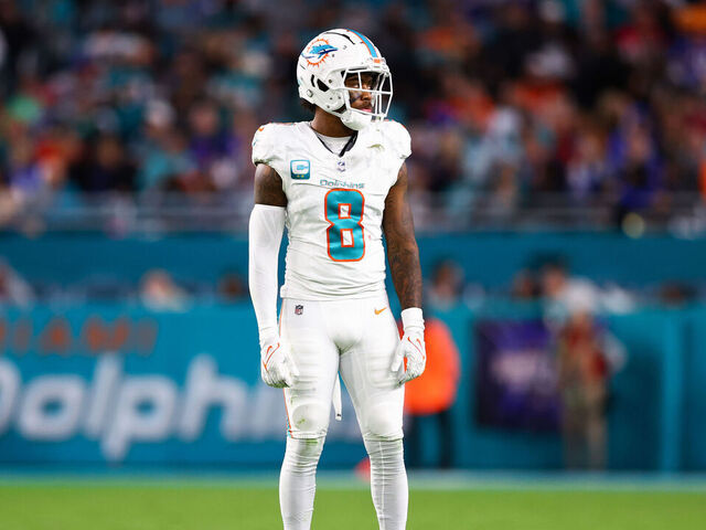 MIAMI GARDENS, FLORIDA - JANUARY 07: Jevon Holland #8 of the Miami Dolphins looks on during the second half against the Buffalo Bills at Hard Rock Stadium on January 07, 2024 in Miami Gardens, Florida.