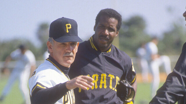 BRADENTON, FL - CIRCA 1987: Manager Jim Leyland #10 of the Pittsburgh Pirates talks with his players Barry Bonds #24 and Bobby Bonilla #25 during a spring training work out circa 1987 in Bradenton, Florida. Bonds played for the Pirates from 1986-92.