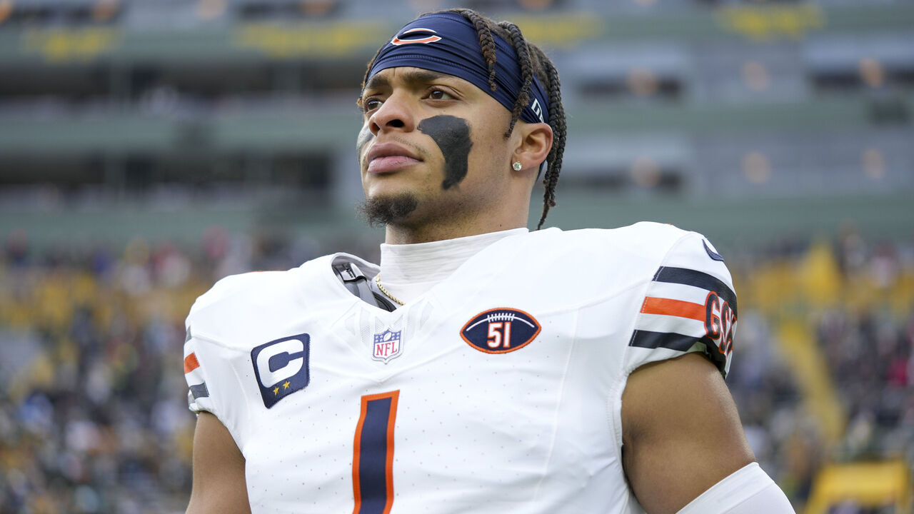 GREEN BAY, WI - JANUARY 7: Quarterback Justin Fields #1 of the Chicago Bears stretches prior to an NFL football game against the Green Bay Packers at Lambeau Field on January 7, 2024 in Green Bay, Wisconsin. The Packers beat the Bears 17-9.
