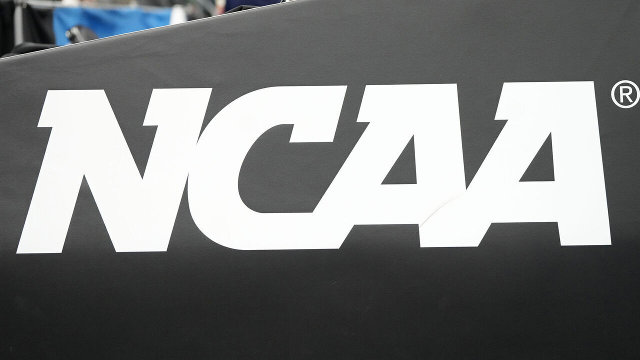 INDIANAPOLIS, INDIANA - MARCH 24: The NCAA logo shown on the basket pad before the Second Round NCAA Men's Basketball Tournament game between the Marquette Golden Eagles and the Colorado Buffaloes at Gainbridge Fieldhouse on March 24, 2024 in Indianapolis, Indiana.
