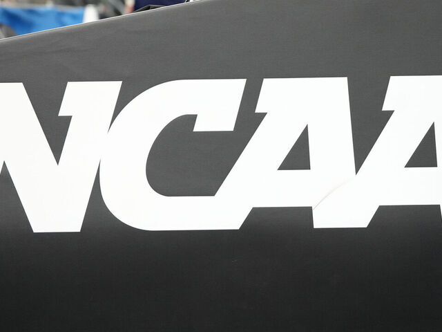 INDIANAPOLIS, INDIANA - MARCH 24: The NCAA logo shown on the basket pad before the Second Round NCAA Men's Basketball Tournament game between the Marquette Golden Eagles and the Colorado Buffaloes at Gainbridge Fieldhouse on March 24, 2024 in Indianapolis, Indiana.