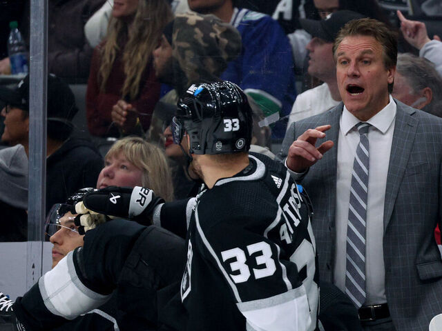 LOS ANGELES, CALIFORNIA - APRIL 06: Head coach Jim Hiller speaks to Viktor Arvidsson #33 during a 6-3 win over the Vancouver Canucks at Crypto.com Arena on April 06, 2024 in Los Angeles, California.