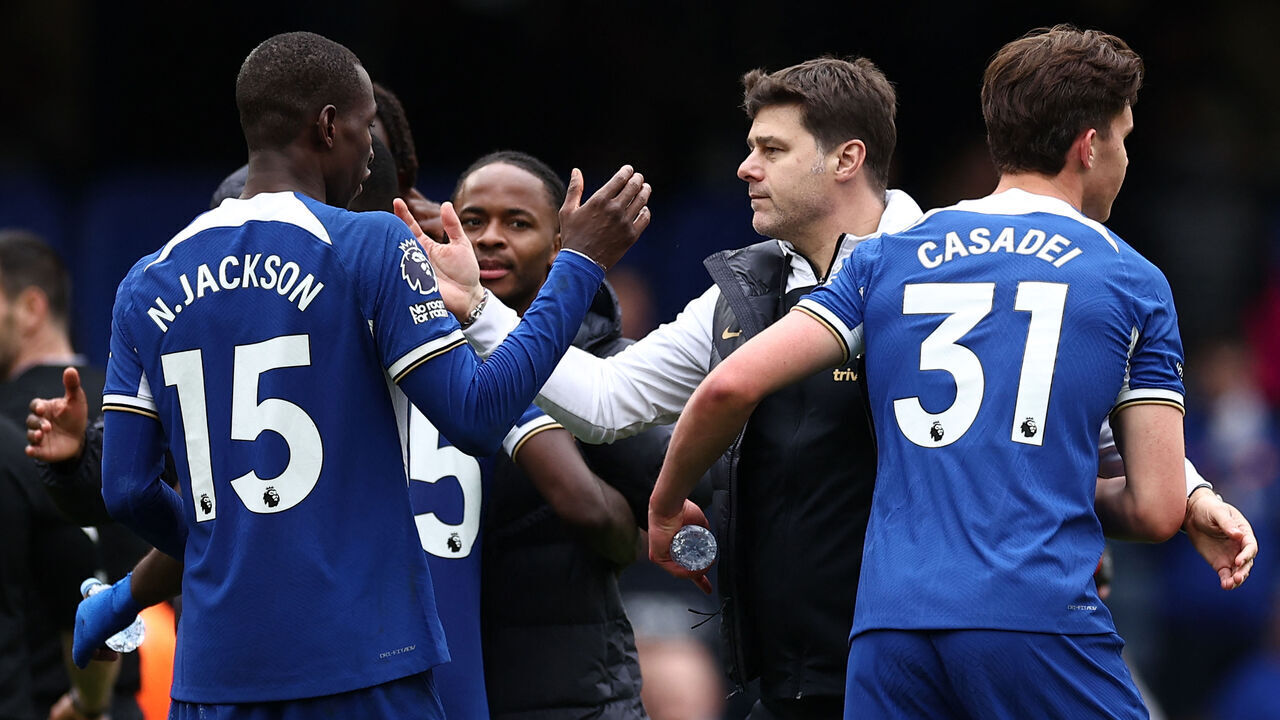 Chelsea's Argentinian head coach Mauricio Pochettino (2R) applauds Chelsea's Senegalese striker #15 Nicolas Jackson (L) following the English Premier League football match between Chelsea and West Ham United at Stamford Bridge in London on May 5, 2024. Chelsea won the match 5-0.