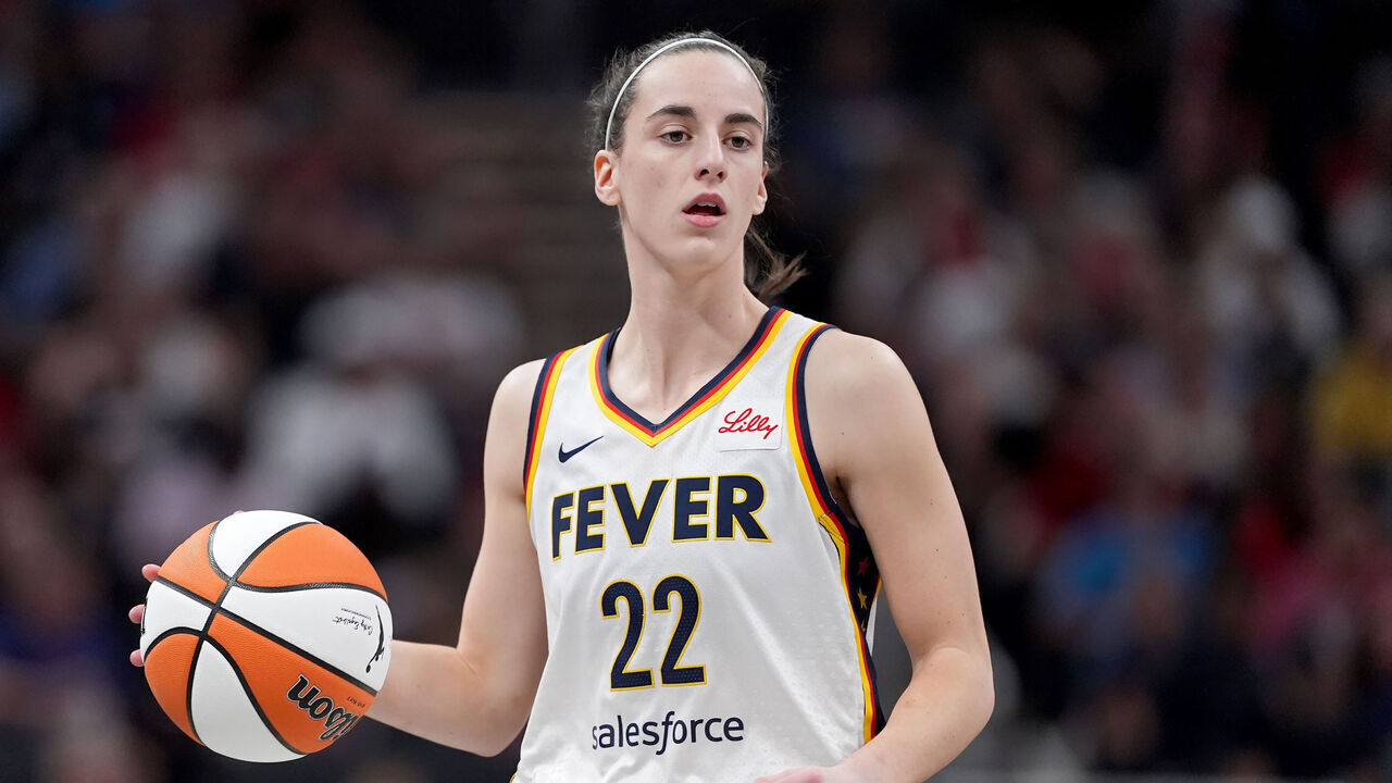 INDIANAPOLIS, INDIANA - MAY 20: Caitlin Clark #22 of the Indiana Fever dribbles the ball during the third quarter in the game at Gainbridge Fieldhouse on May 20, 2024 in Indianapolis, Indiana.