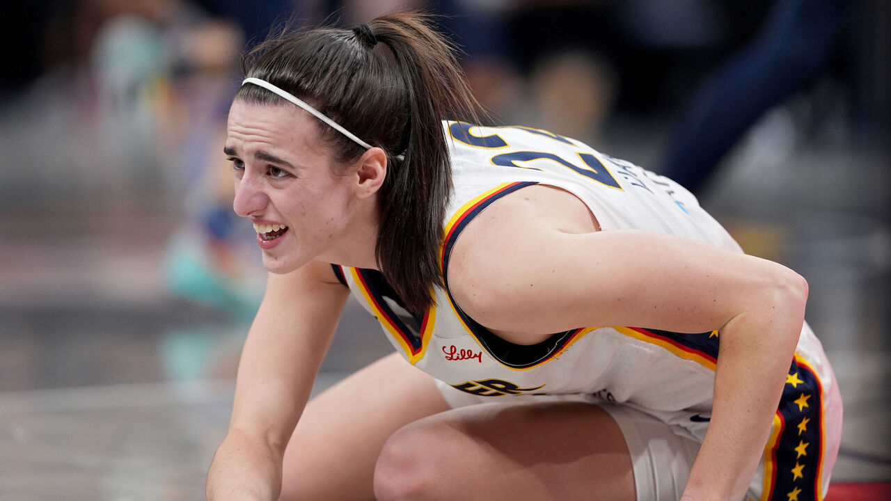 INDIANAPOLIS, INDIANA - MAY 20: Caitlin Clark #22 of the Indiana Fever reacts to an injury during the second quarter in the game at Gainbridge Fieldhouse on May 20, 2024 in Indianapolis, Indiana.