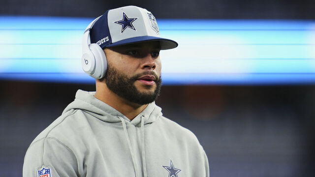 DALLAS, TX - JANUARY 14: Dak Prescott #4 of the Dallas Cowboys warms up before kickoff against the Green Bay Packers during the NFC Wild Card playoff game at AT&T Stadium on January 14, 2024 in Dallas, Texas.