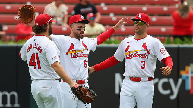 ST LOUIS, MISSOURI - MAY 22: Nate Burleson #41 Michael Siani #63 and Dylan Carlson #3 all of the St. Louis Cardinals celebrate after beating the Baltimore Orioles at Busch Stadium on May 22, 2024 in St Louis, Missouri. This is a continuation of the May 21 game which was suspended due to inclement weather.