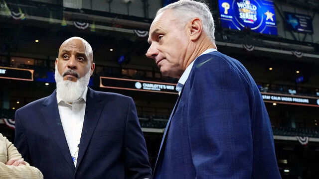 HOUSTON, TX - OCTOBER 29: Executive Director of the Major League Baseball Players Association Tony Clark and Major League Baseball Commissioner Robert D. Manfred Jr. look on during batting practice prior to Game 2 of the 2022 World Series between the Philadelphia Phillies and the Houston Astros at Minute Maid Park on Saturday, October 29, 2022 in Houston, Texas.