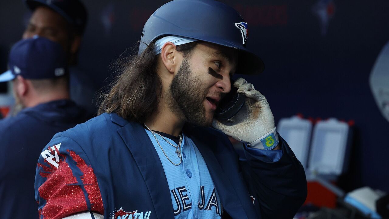 TORONTO, ON- MAY 22 - Toronto Blue Jays shortstop Bo Bichette (11) wears the new home run jacket after hitting a two-run home run in the second inning as the Toronto Blue Jays play the Chicago White Sox at Rogers Centre in Toronto. May 22, 2024. Steve Russell/Toronto Star (Steve Russell/Toronto Star via Getty Images)