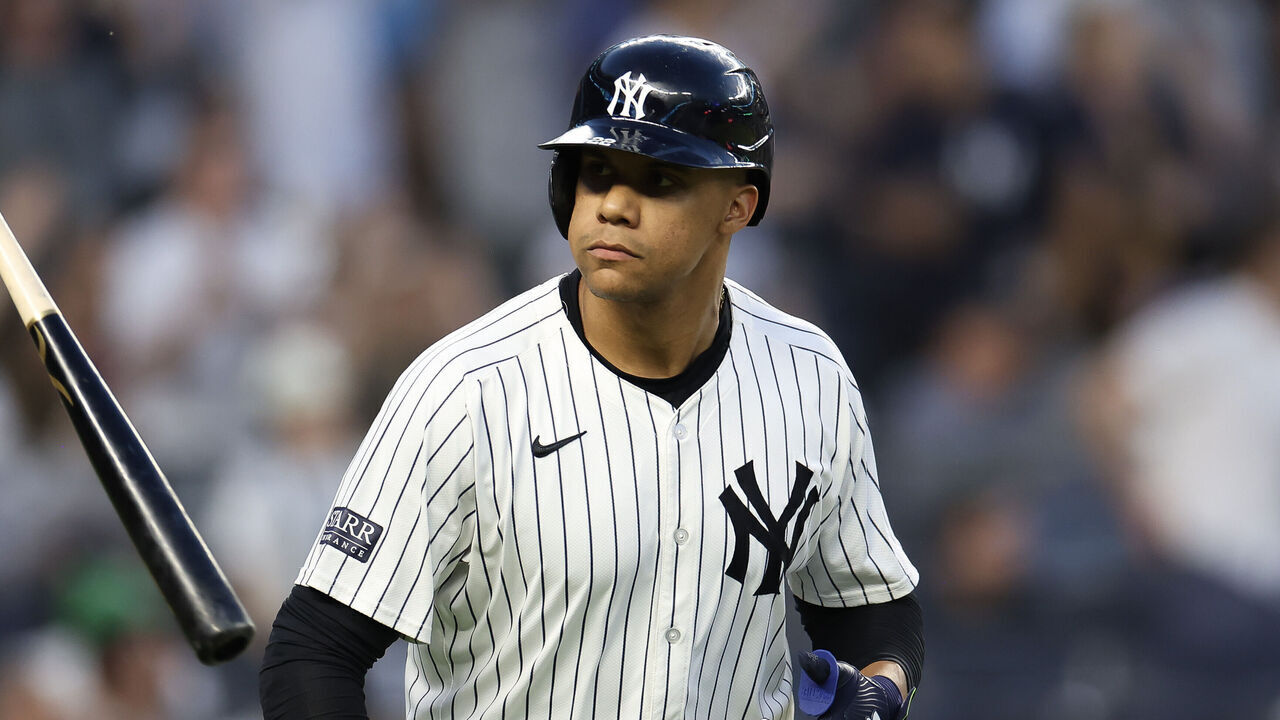 NEW YORK, NEW YORK - MAY 22: Juan Soto #22 of the New York Yankees reacts after hitting a two-run home run against the Seattle Mariners during the third inning at Yankee Stadium on May 22, 2024 in the Bronx borough of New York City.
