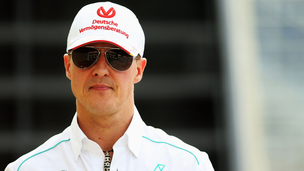 SAO PAULO, BRAZIL - NOVEMBER 23: Michael Schumacher of Germany and Mercedes GP walks in the paddock following practice for the Brazilian Formula One Grand Prix at the Autodromo Jose Carlos Pace on November 23, 2012 in Sao Paulo, Brazil.