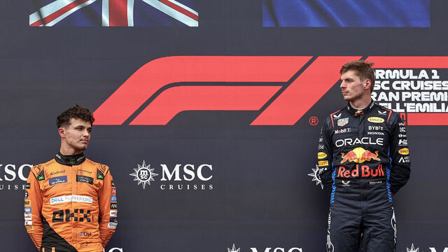 IMOLA, ITALY - MAY 19: Lando Norris of Great Britain and McLaren F1 Team and Max Verstappen of the Netherlands and Oracle Red Bull Racing on the podium during the F1 Grand Prix of Emilia-Romagna at Autodromo Enzo e Dino Ferrari Circuit on May 19, 2024 in Imola, Italy.