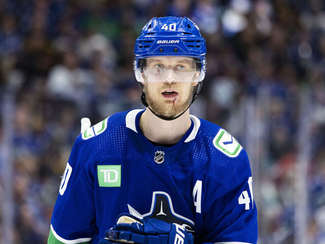 VANCOUVER, BC - MAY 20: Vancouver Canucks center Elias Pettersson (40) shown with a cut to his chin during Game Seven of the Second Round of the 2024 Stanley Cup playoffs between the Edmonton Oilers and the Vancouver Canucks on May 20, 2024, at Rogers Arena in Vancouver, B.C.