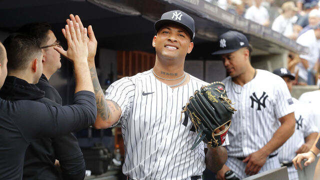 NEW YORK, NEW YORK - MAY 23: Luis Gil #81 of the New York Yankees walks through the dugout after leaving a game in the seventh inning against the Seattle Mariners at Yankee Stadium on May 23, 2024 in New York City.