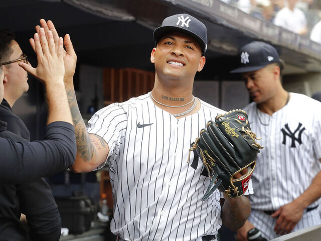NEW YORK, NEW YORK - MAY 23: Luis Gil #81 of the New York Yankees walks through the dugout after leaving a game in the seventh inning against the Seattle Mariners at Yankee Stadium on May 23, 2024 in New York City.