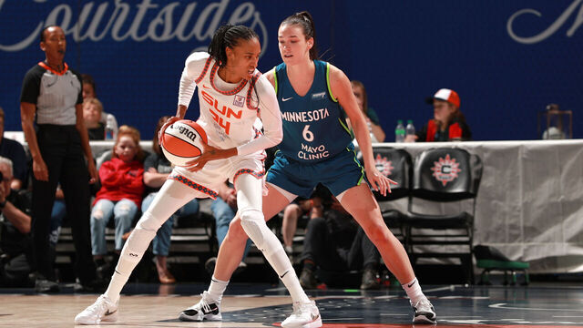 UNCASVILLE, CT - MAY 23: DeWanna Bonner #24 of the Connecticut Sun handles the ball during the game against the Minnesota Lynx on May 23, 2024 at the Mohegan Sun Arena in Uncasville, Connecticut. Mandatory Copyright Notice: Copyright 2024 NBAE