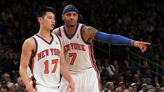 NEW YORK, NY - FEBRUARY 20: (NEW YORK DAILIES OUT) Carmelo Anthony #7 and Jeremy Lin #17 of the New York Knicks in action against the New Jersey Nets on February 20, 2012 at Madison Square Garden in New York City. The Nets defeated the Knicks 100-92. NOTE TO USER: User expressly acknowledges and agrees that, by downloading and/or using this Photograph, user is consenting to the terms and conditions of the Getty Images License Agreement.