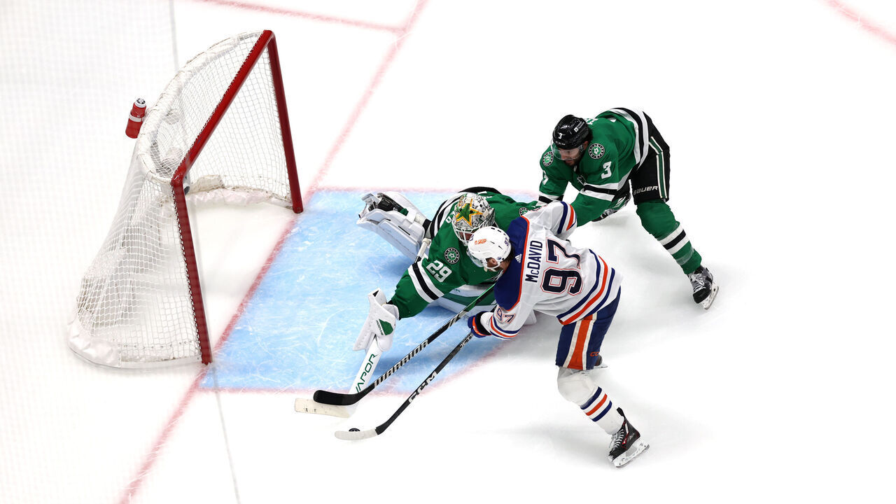 DALLAS, TEXAS - MAY 23: Jake Oettinger #29 of the Dallas Stars makes a save against Connor McDavid #97 of the Edmonton Oilers during overtime in Game One of the Western Conference Final of the 2024 Stanley Cup Playoffs at American Airlines Center on May 23, 2024 in Dallas, Texas.