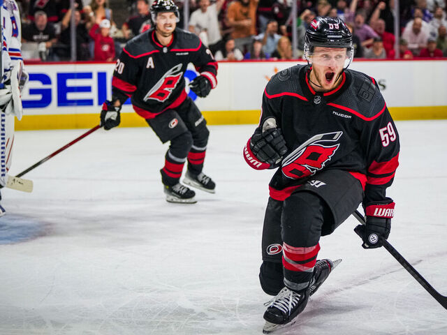 RALEIGH, NORTH CAROLINA - MAY 09: Jake Guentzel #59 of the Carolina Hurricanes celebrates his goal against the New York Rangers during the first period in Game Three of the Second Round of the 2024 Stanley Cup Playoffs at PNC Arena on May 09, 2024 in Raleigh, North Carolina.