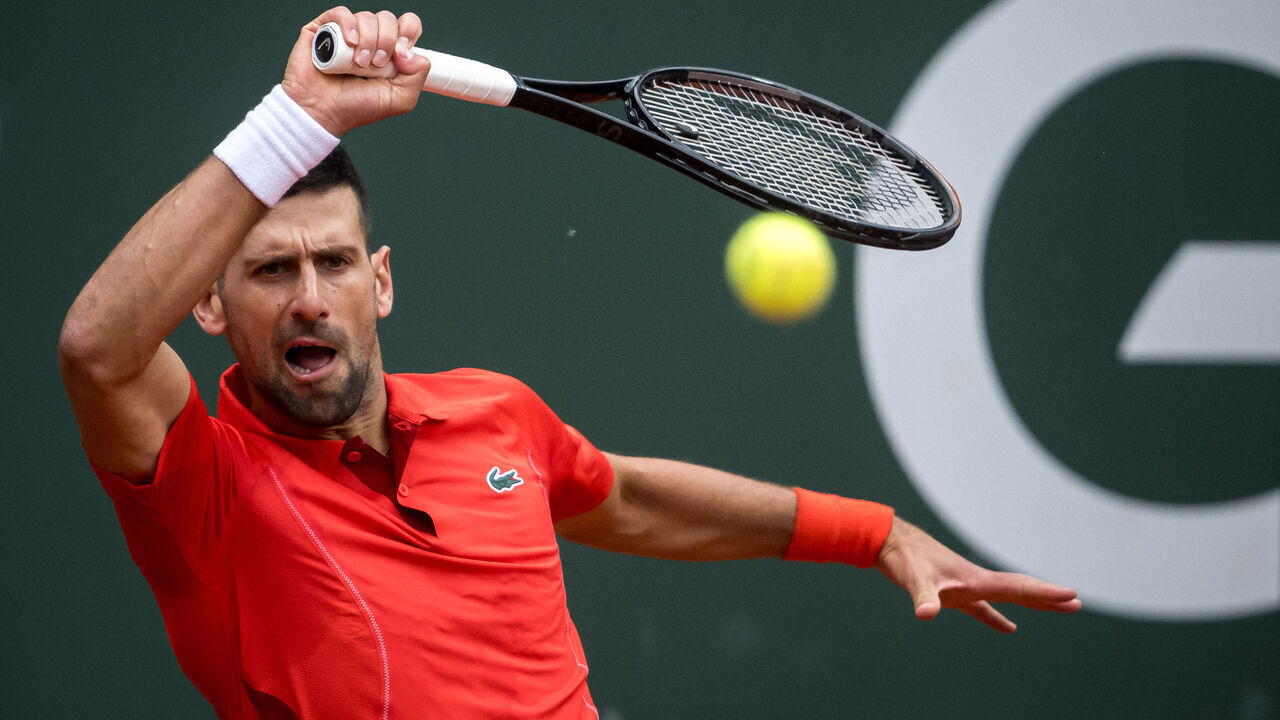 Serbia's Novak Djokovic plays a forehand return to Netherlands' Tallon Griekspoor during their ATP 250 Geneva Open tennis tournament single quarter final match, in Geneva on May 23, 2024.