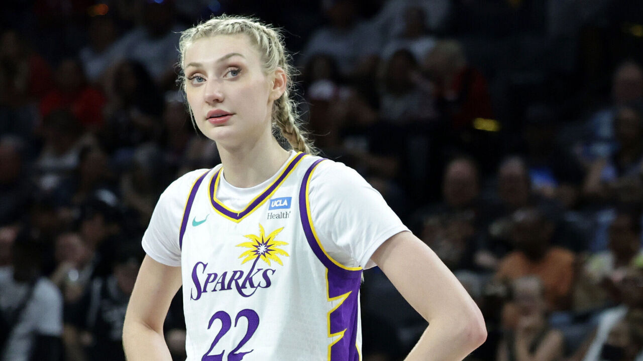 LAS VEGAS, NEVADA - MAY 18: Cameron Brink #22 of the Los Angeles Sparks and A'ja Wilson #22 of the Las Vegas Aces wait for a Sparks player to shoot a free throw in the third quarter of their game at Michelob ULTRA Arena on May 18, 2024 in Las Vegas, Nevada. The Aces defeated the Sparks 89-82.