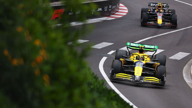 MONTE-CARLO, MONACO - MAY 24: Lando Norris of Great Britain driving the (4) McLaren MCL38 Mercedes leads Sergio Perez of Mexico driving the (11) Oracle Red Bull Racing RB20 on track during practice ahead of the F1 Grand Prix of Monaco at Circuit de Monaco on May 24, 2024 in Monte-Carlo, Monaco.
