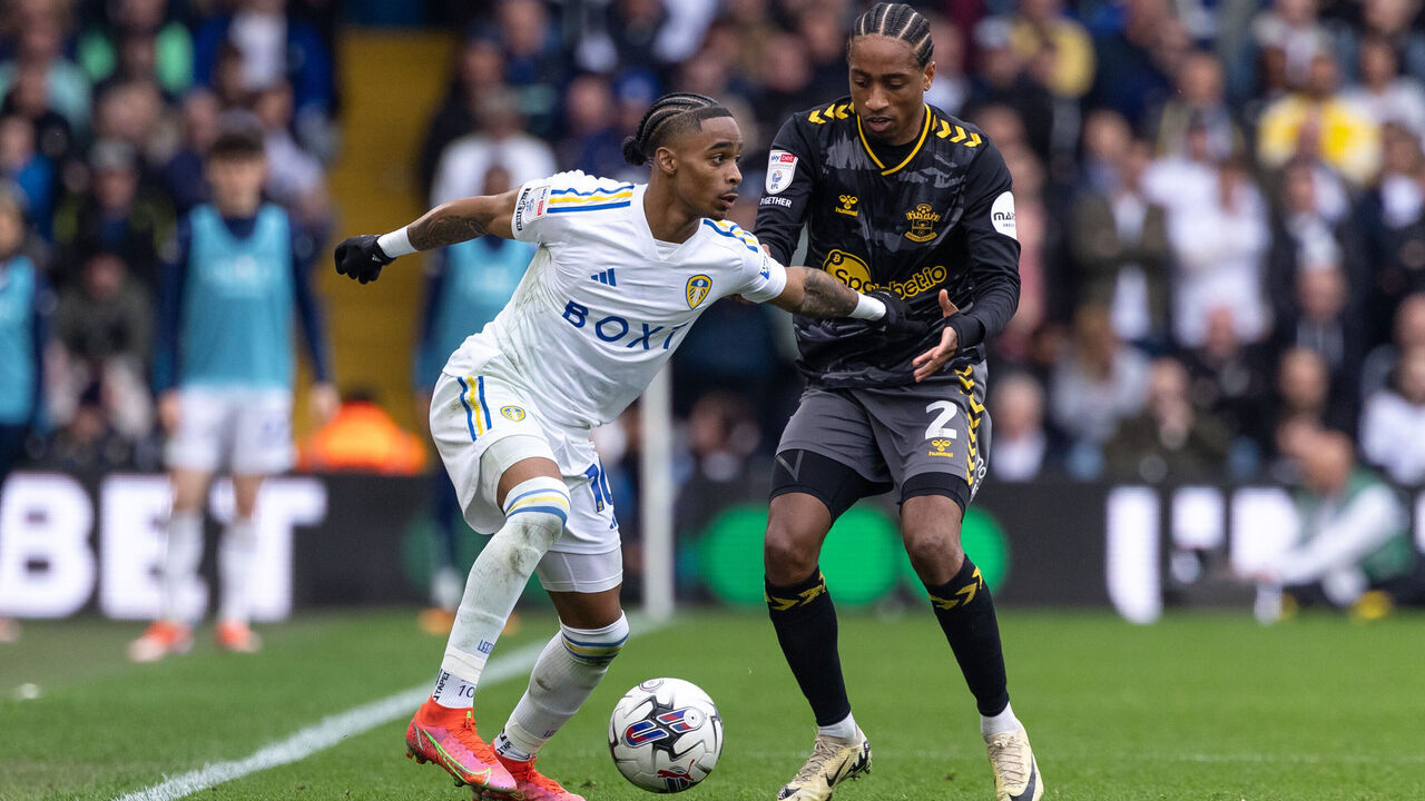 Crysencio Summerville of Leeds United is battling with Kyle Walker-Peters of Southampton during the Sky Bet Championship match between Leeds United and Southampton at Elland Road in Leeds, on May 4, 2024.