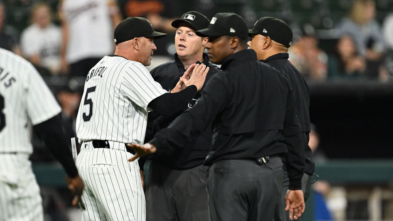 CHICAGO, IL - MAY 23: Manager Pedro Grifol #5 of the Chicago White Sox talks with umpires after baserunner Andrew Vaughn #25 was called out for interference ending the game against the Baltimore Orioles at Guaranteed Rate Field on May 23, 2024 in Chicago, Illinois. Baltimore defeated Chicago 8-6.