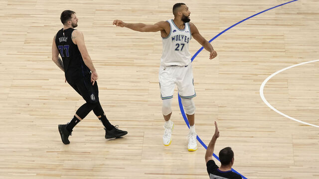 MINNEAPOLIS, MN - MAY 24: Luka Doncic #77 of the Dallas Mavericks watches his game winning shot against Rudy Gobert #27 of the Minnesota Timberwolves during Round 3 Game 2 of the 2024 NBA Playoffs on May 24, 2024 at Target Center in Minneapolis, Minnesota. Mandatory Copyright Notice: Copyright 2024 NBAE