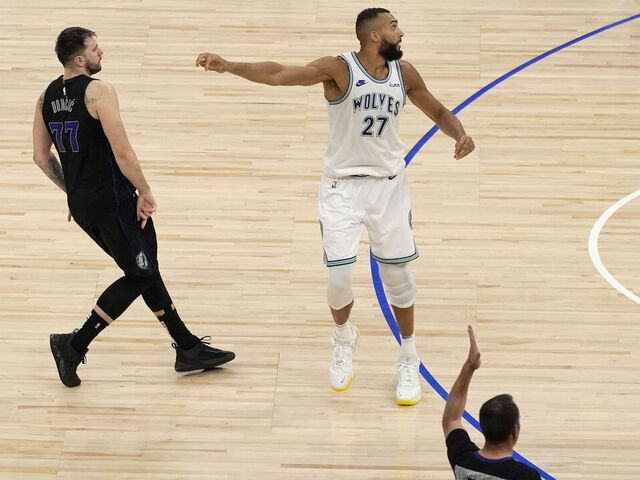 MINNEAPOLIS, MN - MAY 24: Luka Doncic #77 of the Dallas Mavericks watches his game winning shot against Rudy Gobert #27 of the Minnesota Timberwolves during Round 3 Game 2 of the 2024 NBA Playoffs on May 24, 2024 at Target Center in Minneapolis, Minnesota. Mandatory Copyright Notice: Copyright 2024 NBAE