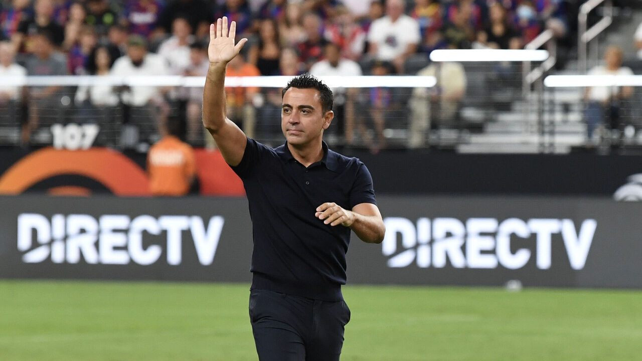 LAS VEGAS, NEVADA - AUGUST 01: Manager Xavier "Xavi" Hernández Creus of FC Barcelona waves to the crowd before of a preseason friendly match against AC Milan during the 2023 Soccer Champions Tour at Allegiant Stadium on August 01, 2023 in Las Vegas, Nevada.