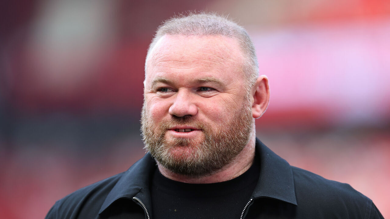 MANCHESTER, ENGLAND - MAY 12: Wayne Rooney, working as a pundit for Sky Sports during the Premier League match between Manchester United and Arsenal FC at Old Trafford on May 12, 2024 in Manchester, England.