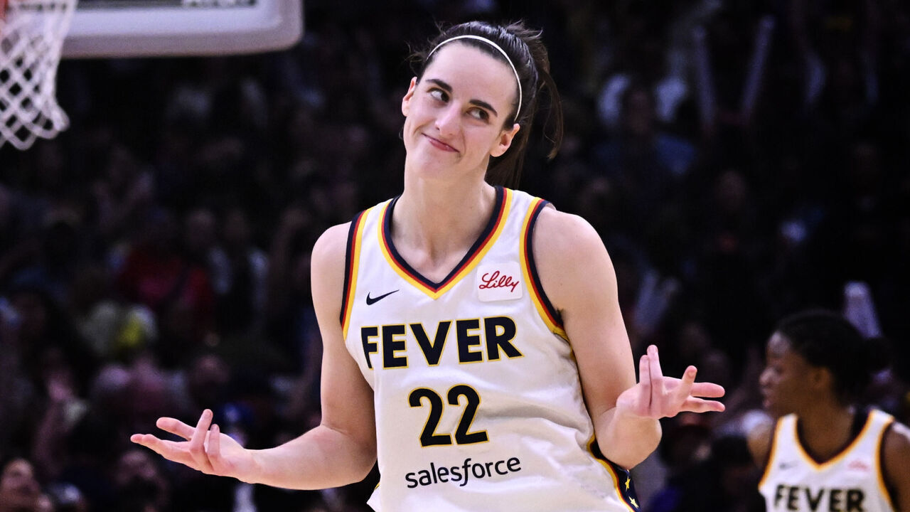 Los Angeles, CA - May 24: Guard Caitlin Clark #22 of the Indiana Fever reacts after making a three point shot against the Los Angeles Sparks in the fourth quarter of a WNBA basketball game at Crypto.com Arena in Los Angeles on Friday, May 24, 2024.
