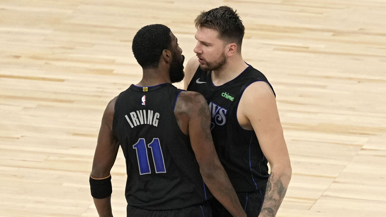MINNEAPOLIS, MN - MAY 24: Kyrie Irving #11 and Luka Doncic #77 of the Dallas Mavericks celebrate against the Minnesota Timberwolves during Round 3 Game 2 of the 2024 NBA Playoffs on May 24, 2024 at Target Center in Minneapolis, Minnesota. Mandatory Copyright Notice: Copyright 2024 NBAE