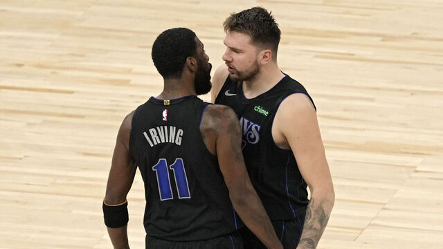 MINNEAPOLIS, MN - MAY 24: Kyrie Irving #11 and Luka Doncic #77 of the Dallas Mavericks celebrate against the Minnesota Timberwolves during Round 3 Game 2 of the 2024 NBA Playoffs on May 24, 2024 at Target Center in Minneapolis, Minnesota. Mandatory Copyright Notice: Copyright 2024 NBAE