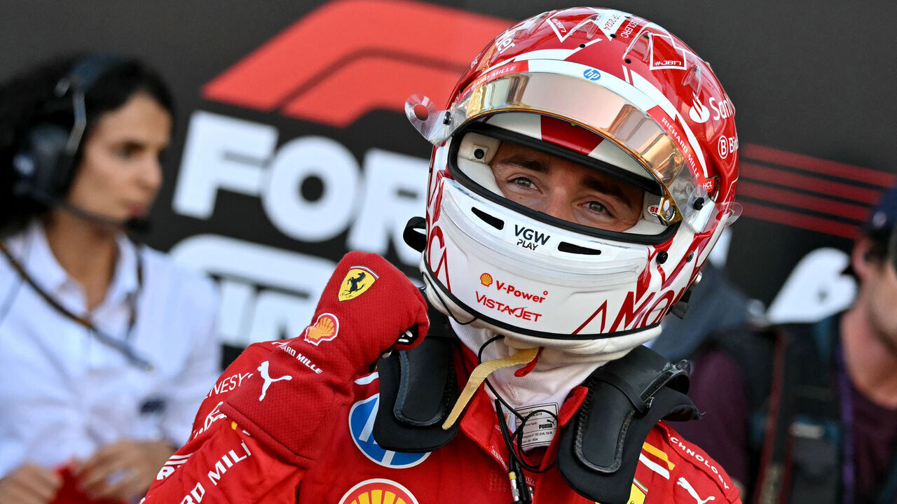 Ferrari's Monegasque driver Charles Leclerc celebrates after winning the qualifying session of the Formula One Monaco Grand Prix on May 25 2024 at the Circuit de Monaco, on the eve of the race.
