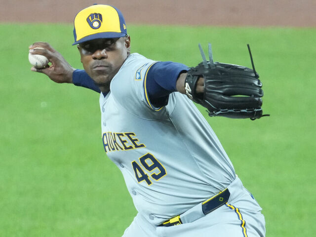 BALTIMORE, MARYLAND - APRIL 12: Thyago Vieira #49 of the Milwaukee Brewers pitches during a baseball game against the Baltimore Orioles at Oriole Park at Camden Yards on April 12, 2024 in Baltimore, Maryland.