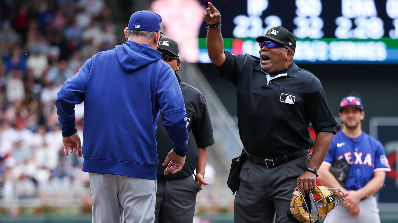 MINNEAPOLIS, MINNESOTA - MAY 25: Manager Bruce Bochy #15 of the Texas Rangers is ejected by umpire Laz Diaz #63 for arguing whether the foul tip was caught during the seventh inning against the Minnesota Twins at Target Field on May 25, 2024 in Minneapolis, Minnesota. The Twins defeated the Rangers 5-3.