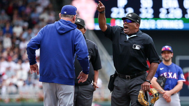 MINNEAPOLIS, MINNESOTA - MAY 25: Manager Bruce Bochy #15 of the Texas Rangers is ejected by umpire Laz Diaz #63 for arguing whether the foul tip was caught during the seventh inning against the Minnesota Twins at Target Field on May 25, 2024 in Minneapolis, Minnesota. The Twins defeated the Rangers 5-3.