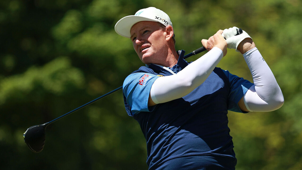 Ernie Els of South Africa tees off on the 12th hole during the third round of the KitchenAid Senior PGA Championship at Harbor Shores Resort in Benton Harbor, Michigan, USA, on Saturday, May 25,2024.