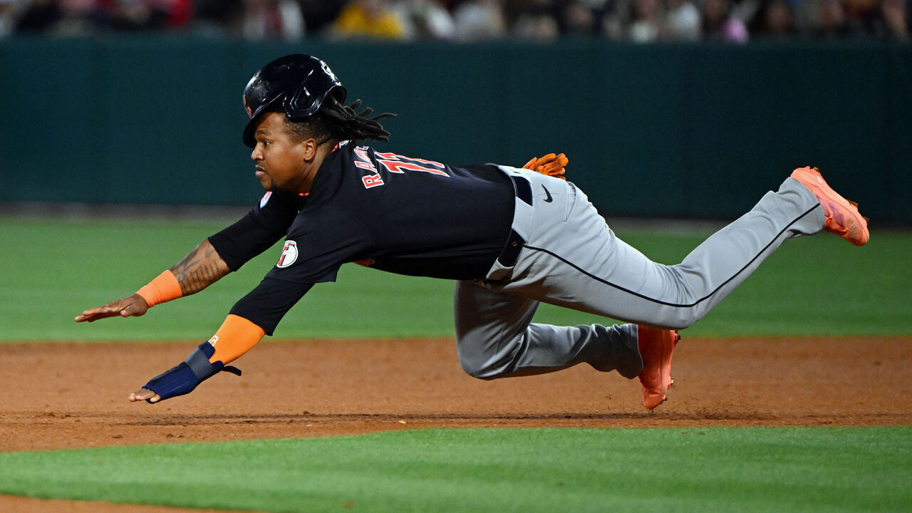 ANAHEIM, CA - MAY 25: Cleveland Guardians third baseman Jose Ramirez (11) tries to steal second base during an MLB baseball game against the Los Angeles Angels played on May 25, 2024 at Angel Stadium in Anaheim, CA.