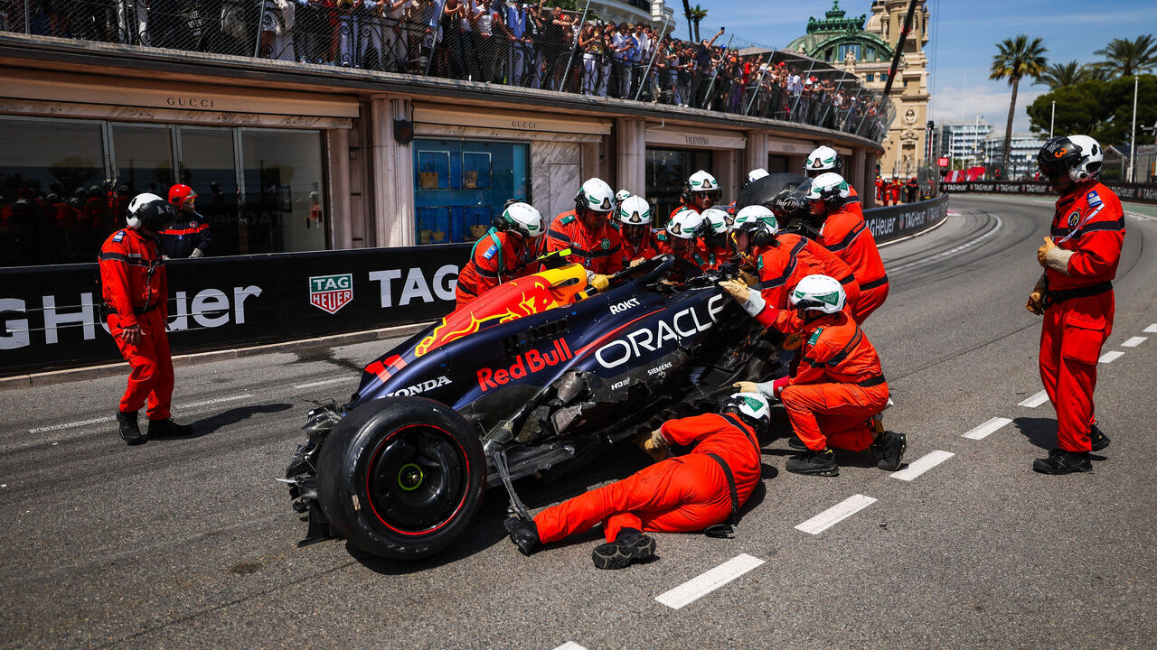 MONTE-CARLO, MONACO - MAY 26: Sergio Perez of Mexico and Oracle Red Bull Racing's car attended to by the stewards after crashing on lap one during the F1 Grand Prix of Monaco at Circuit de Monaco on May 26, 2024 in Monte-Carlo, Monaco.