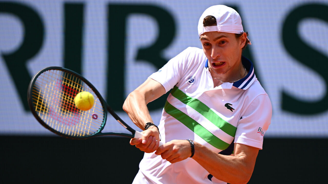 PARIS, FRANCE - MAY 26: Ugo Humbert of France plays a backhand against Lorenzo Sonego of Italy in the Men's Singles first round match on Day One of the 2024 French Open at Roland Garros on May 26, 2024 in Paris, France.