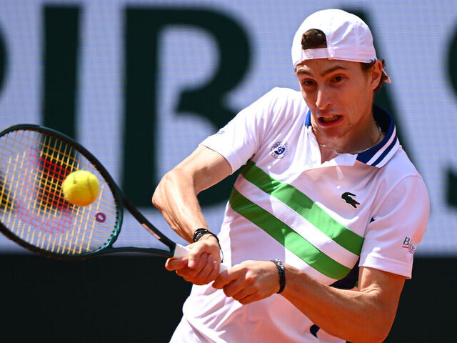 PARIS, FRANCE - MAY 26: Ugo Humbert of France plays a backhand against Lorenzo Sonego of Italy in the Men's Singles first round match on Day One of the 2024 French Open at Roland Garros on May 26, 2024 in Paris, France.