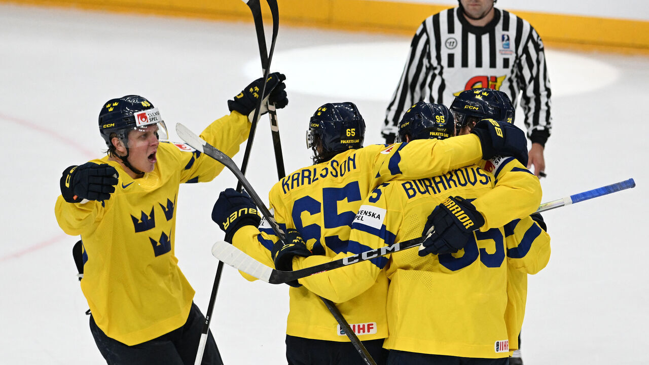 Sweden's players celebrate after scoring during the IIHF Ice Hockey Men's World Championship - bronze medal match between Canada and Sweden in Prague, Czech Republic on May 27, 2024.