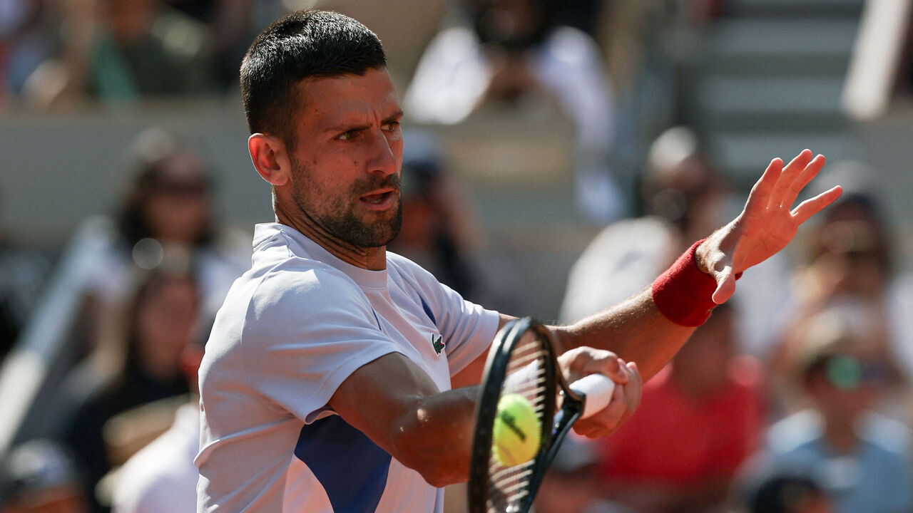 Serbia's Novak Djokovic takes part in a practice session during the French Open tennis tournament on Court Philippe-Chatrier at the Roland Garros Complex in Paris on May 25, 2024.