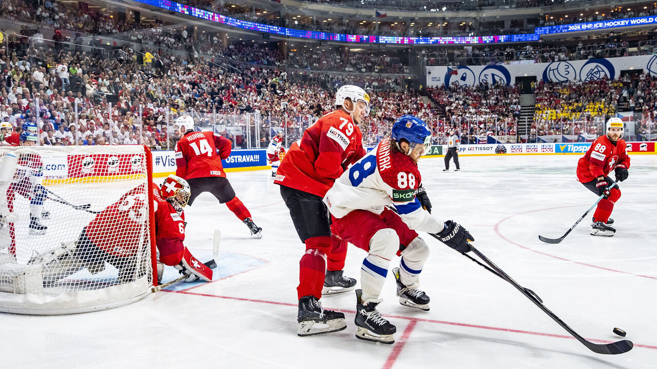 PRAGUE, CZECH REPUBLIC - MAY 26: David Pastrnak of Czechia (R) against Calvin Thurkauf of Switzerland during 2024 IIHF Ice Hockey World Championship Czechia Final match between Switzerland and Czech Republic at Prague Arena on May 26, 2024 in Prague, Czech Republic.
