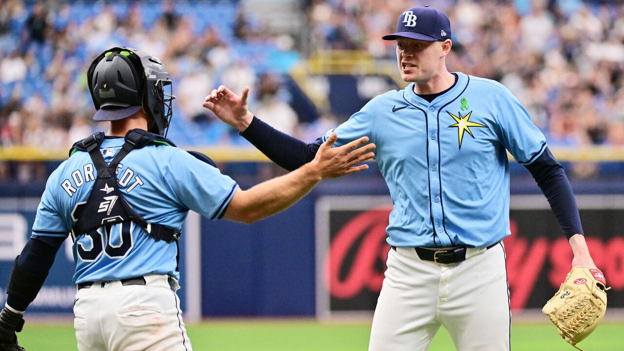 ST PETERSBURG, FLORIDA - MAY 26: Pete Fairbanks #29 of the Tampa Bay Rays celebrates with Ben Rortvedt #30 after defeating the Kansas City Royals 4-1 at Tropicana Field on May 26, 2024 in St Petersburg, Florida.